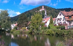 a German lake with houses in the background